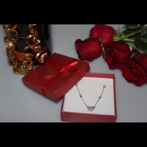 925 Sterling Silver Necklace with heart pendant.